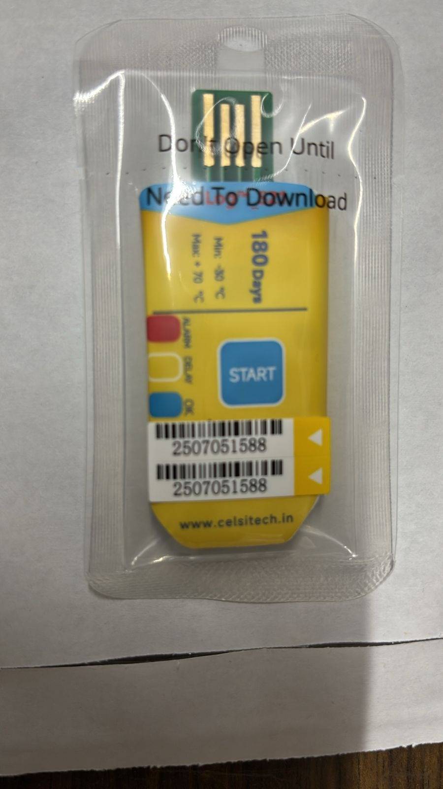 Temperature Single Use Data Logger gadget in yellow color packet